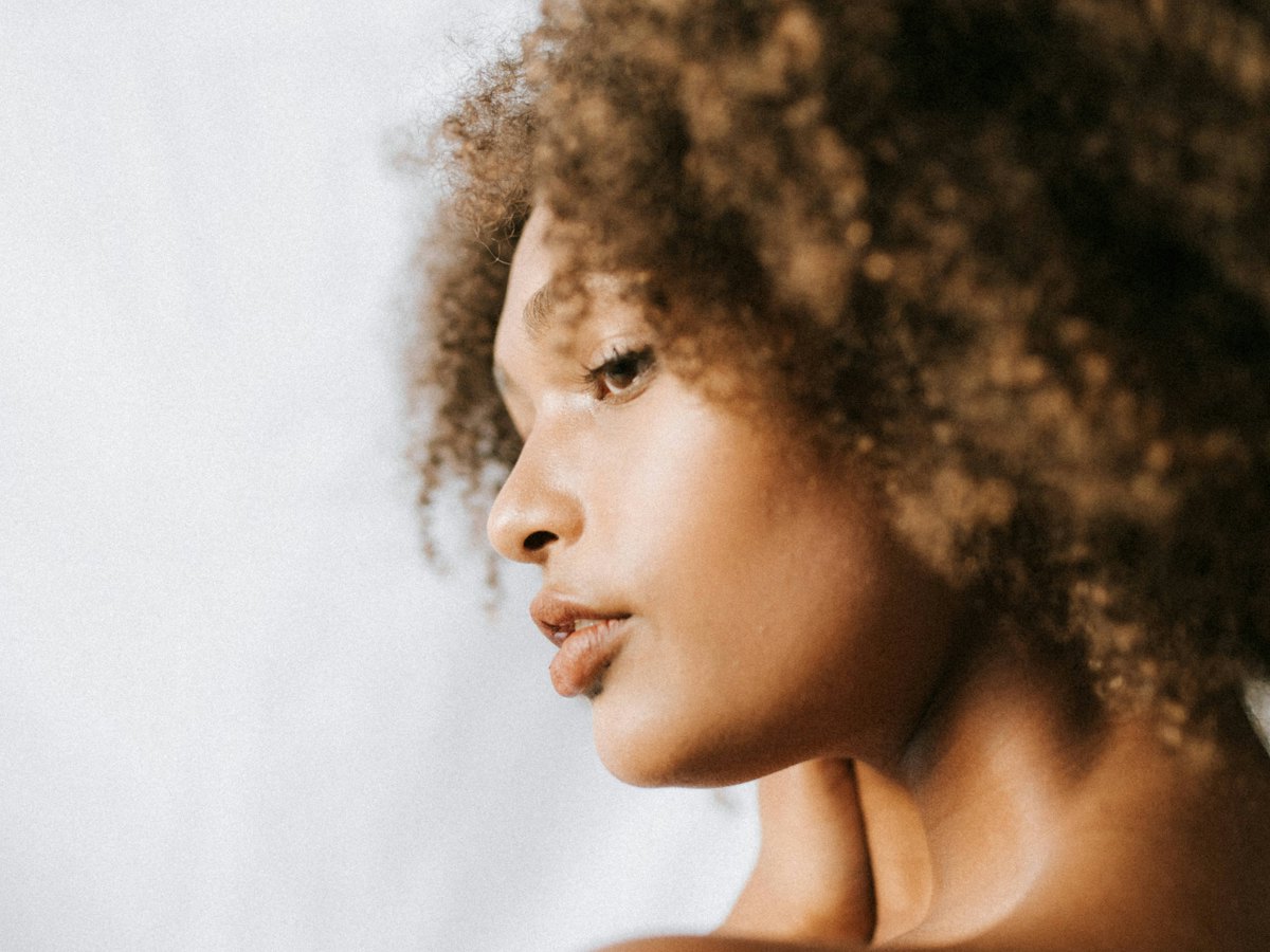Profile portrait of a woman with natural skin